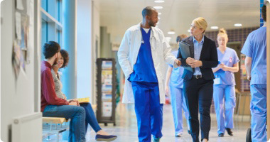 Healthcare workers in a hallway